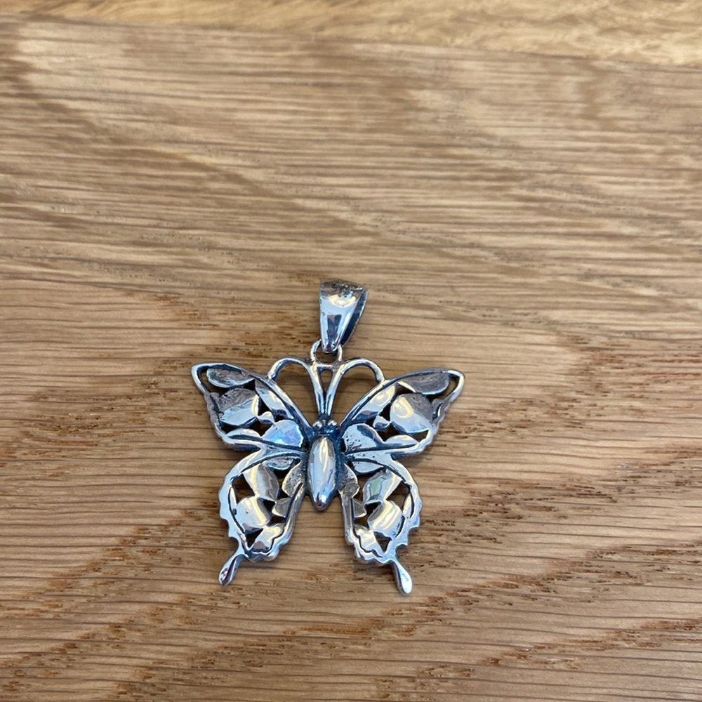 ARTISAN sterling silver butterfly pendant. Pretty cut out design!
